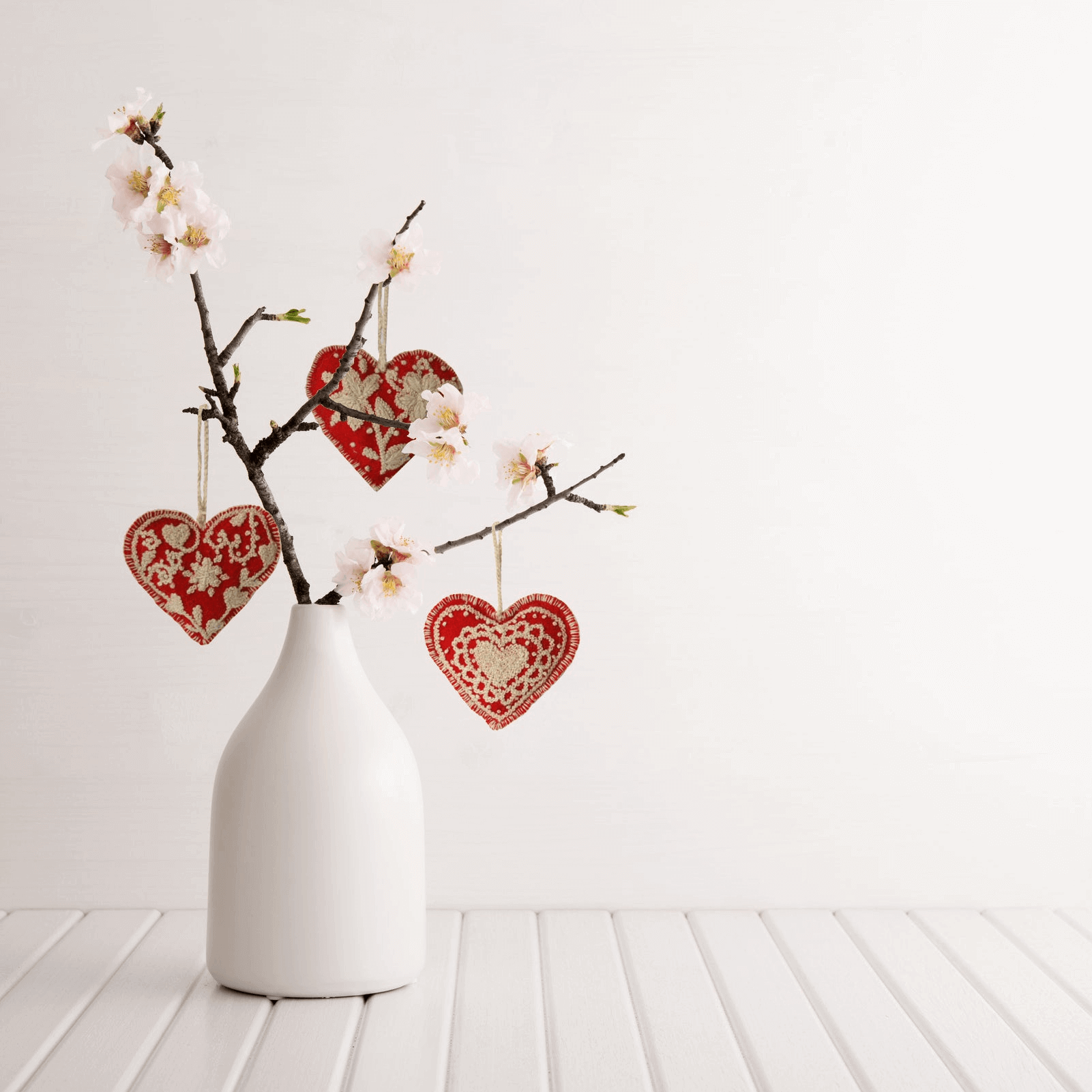 Set fo three embroidered heart ornaments